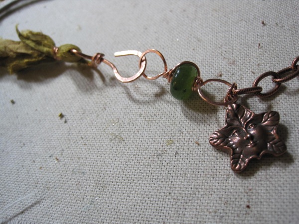 clasp and charm detail clasp and charm detail